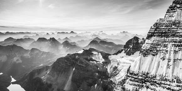 One of my favorite pano's from all my climbs - looking across the east face / ridge of Assiniboine at a smoky morning sunrise.