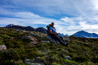 A very satisfied Kevin Barton takes a well-deserved rest break in the alpine meadows above the Geraldine Lakes.