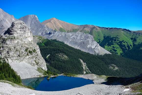 Bogart Tower (L) and the third Memorial Lake. If you have the time and energy, it's worth hiking up scree beyond and above the lake for views like this.