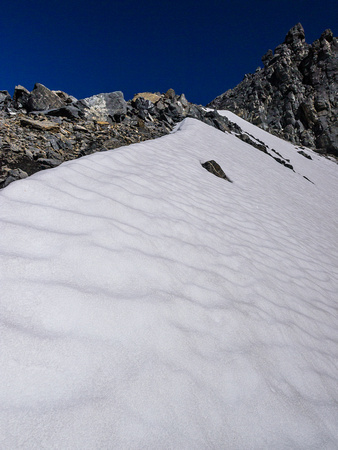 Avoiding scree and slabs by taking snow.