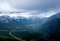 Rain to the south - note the snow on Nakiska's ski runs in the distance.