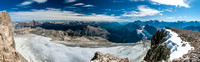 A summit ridge panorama looking south towards the Skoki area on the left and Lake Louise peaks on the right.