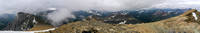 Summit panorama with the outlier at left, Blackiston in clouds at left, Lost at left of center with Festubert in clouds beyond, Kootenai-Brown and Bauerman at right of center with Kishinena Peak beyon