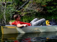 Vern chills in the canoe.