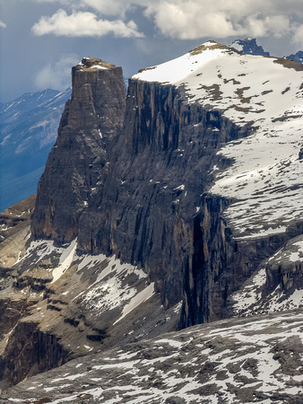 A brooding Eisenhower Tower and Castle Mountain from the descent of Stuart Knob.