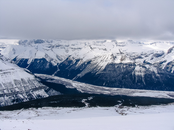 The northern end of the Columbia Icefield is hidden in clouds at left.