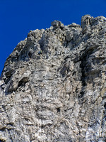 Note the two guys down climbing the 'normal' Kane crux wall that protects the summit block.