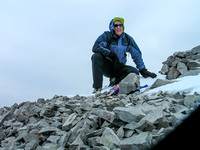 Vern at the windy, cold and grey summit of Sentry Mountain.