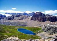 Lovely Helen Lake with Crystal Ridge and Crowfoot Mountain rising beyond.