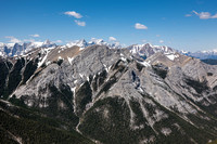Looking over Wasootch Peak towards Mount Collembola and Lougheed at distant center.