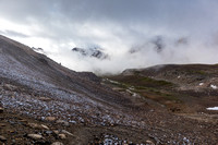 Minnow Peak is buried in clouds over North Molar Pass.