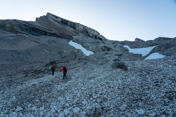 Ascending scree / slabs and frozen dirt to the Deluc Glacier.
