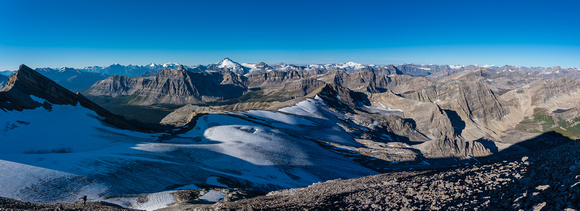 An incredible panorama of peaks starts to appear as we ascend the SW slopes of Deluc.