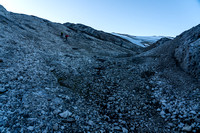 Ascending scree / slabs and frozen dirt to the Deluc Glacier.