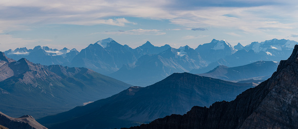 Lake Louise peaks including Mount Temple and Huber in the hazy distance.
