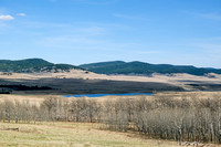 Views over a lake on the ranch property.