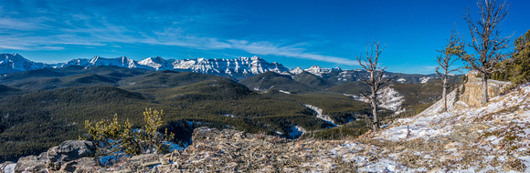 Panorama looking ahead along the ridge. Bluerock Mountain and Mount Burns to the left.
