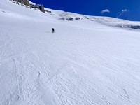 Ascending the SW bowl under the summit. Cornice exposure from upper left.