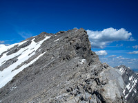 The only difficult scrambling is the exposed and loose summit ridge.