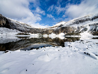 One more wide-angle shot of Rockbound Lake with some blue sky and fresh snow.